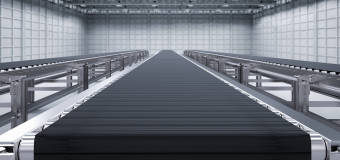 Jakie przenośniki przemysłowe wybrać do magazynu?